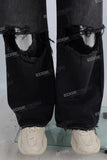 Black wide leg damaged boot cut jeans