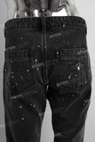 Black stack patchwork paint splatters jeans