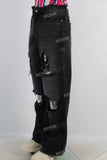 Black wide leg damaged boot cut jeans