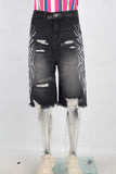 Black damaged embroidered boot cut shorts
