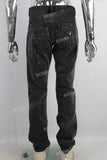 Black stack patchwork paint splatters jeans