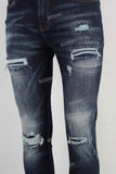 Blue damaged skinny jeans