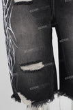 Black damaged embroidered boot cut shorts