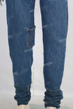 Double laver waistband patchwork damaged jeans