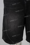 Black acid washed damaged shorts