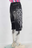Black damaged embroidered boot cut shorts