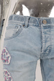 Blue embroidered patchwork damaged jeans