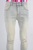 Acid washed damaged skinny jeans