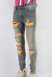 Acid washed damaged embroidered skinny jeans