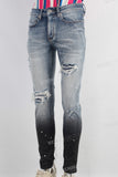 Blue damaged skinny paint splatters jeans