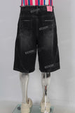 Black acid washed damaged shorts