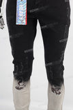 Black tie dye damaged jeans