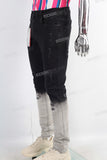Black tie dye damaged jeans