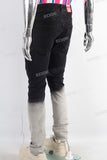 Black tie dye damaged jeans