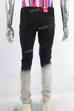 Black tie dye damaged jeans