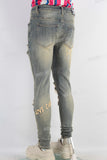 Acid washed damaged embroidered skinny jeans