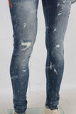 Blue damaged skinny jeans
