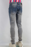Acid washed damaged laser skinny jeans