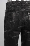 Black waxed flare jeans