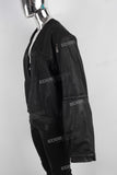 Black oversize and loose waxed jacket