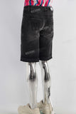 Black embroidered boot cut shorts