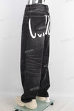 Black acid washed digital print jeans