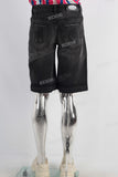 Black embroidered boot cut shorts