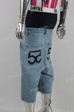 Blue patchwork damaged boot cut shorts