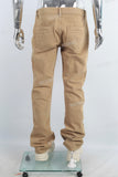 Yellow paint splatters stack jeans
