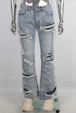 Blue damaged bell bottom jeans