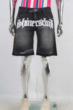 Black embroidered damaged shorts