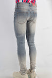 Blue acid washed damaged skinny jeans