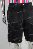 Black damaged rivet shorts