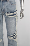 Blue damaged bell bottom jeans