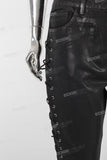 Double layered black waxed flared jeans
