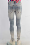 Blue acid washed damaged skinny jeans