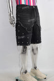 Black damaged rivet shorts