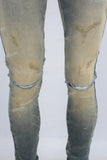 Green vintage damaged skinny jeans