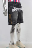 Black embroidered damaged shorts