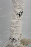 J22374 White Embroidered Ripped Mans Stack Jeans