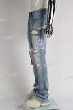 blue distressed flare bottom stacked men jeans with embroidery