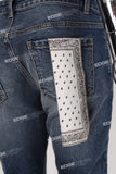 blue ripped men jeans with embroidery logo