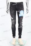 black distressed paint splatters skinny men jeans with screen printed logo