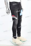 black distressed paint splatters skinny men jeans with screen printed logo
