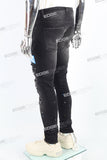black distressed paint splatters skinny men jeans with screen printed logo
