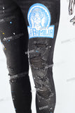 black distressed paint splatters skinny men jeans with screen printed logo