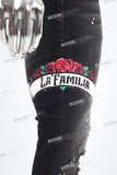 black distressed paint splatters skinny men jeans with screen printed logo