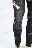black distressed paint splatters skinny men jeans with screen printed logo