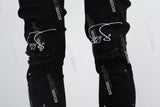 black paint spplatters distressed skinny men jeans with embroidery logo